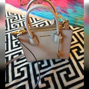 Michael Kors beige small to medium size cross Body purse. VERA Bradley bag.